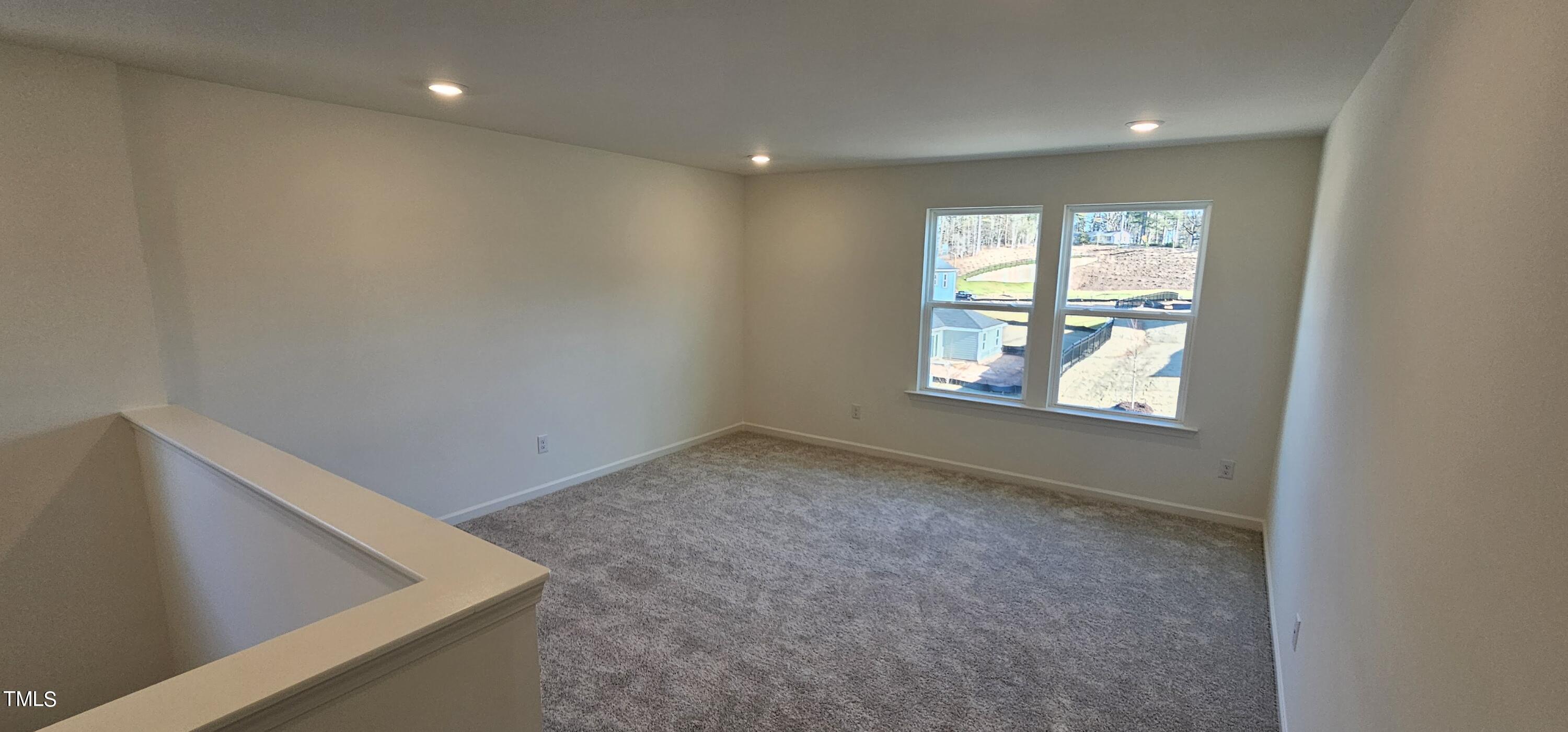 1409 Underbrush Drive Durham, NC 27703 - Photo 7 of 21 a view of an empty room with a window