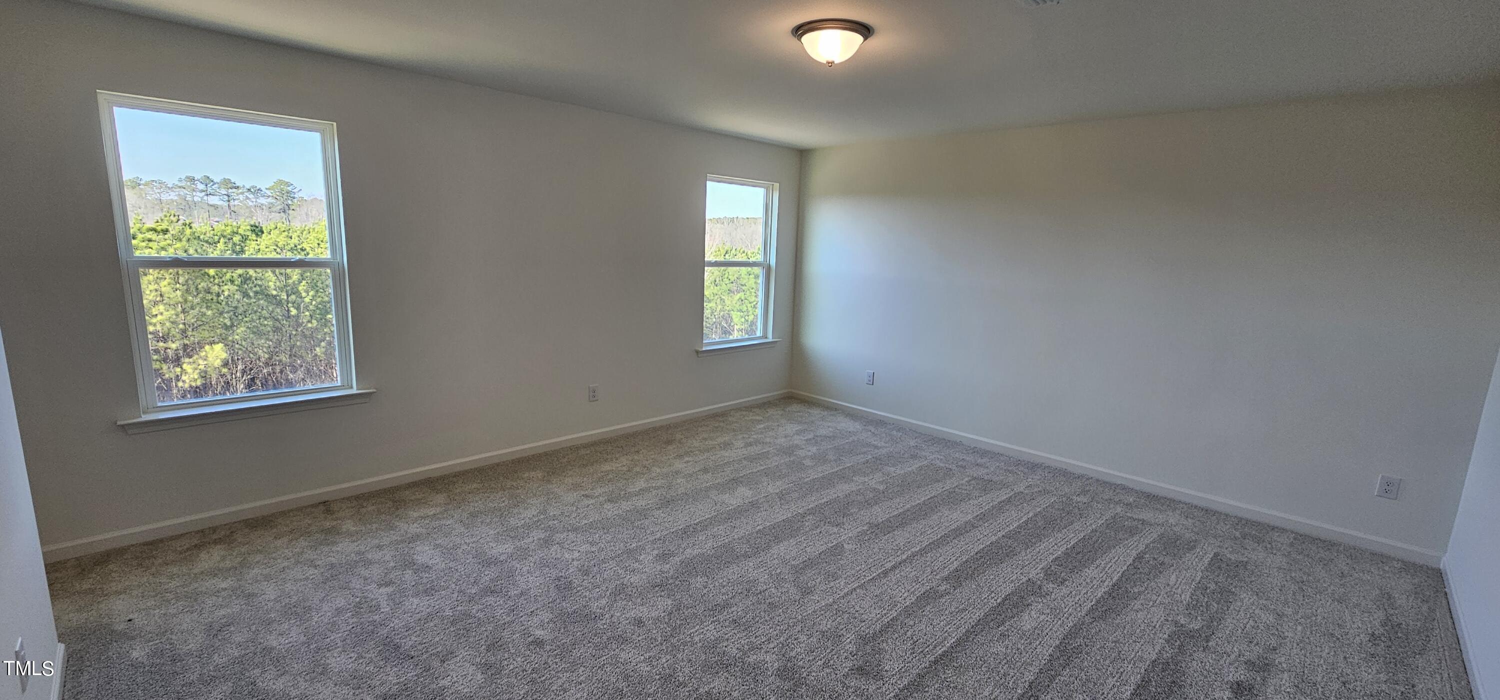 1409 Underbrush Drive Durham, NC 27703 - Photo 8 of 21 an empty room with a window