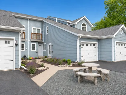 a front view of a house with patio