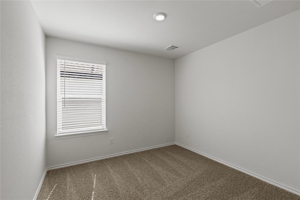 7016 Vining Drive Princeton, TX 75407 - Photo 15 of 22 an empty room with a window