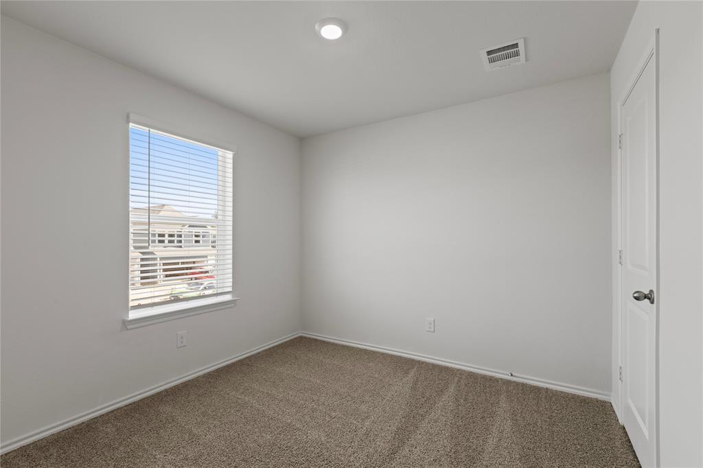 7016 Vining Drive Princeton, TX 75407 - Photo 20 of 22 a view of an empty room with a window