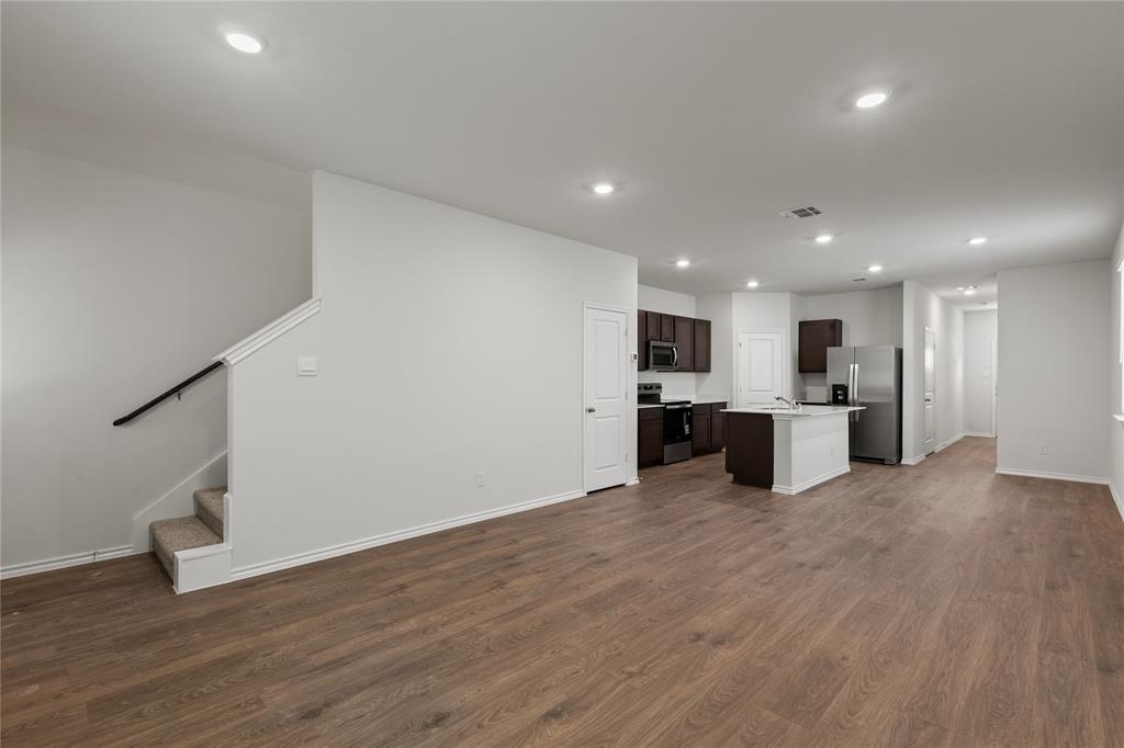 7016 Vining Drive Princeton, TX 75407 - Photo 9 of 22 a view of kitchen with wooden floor