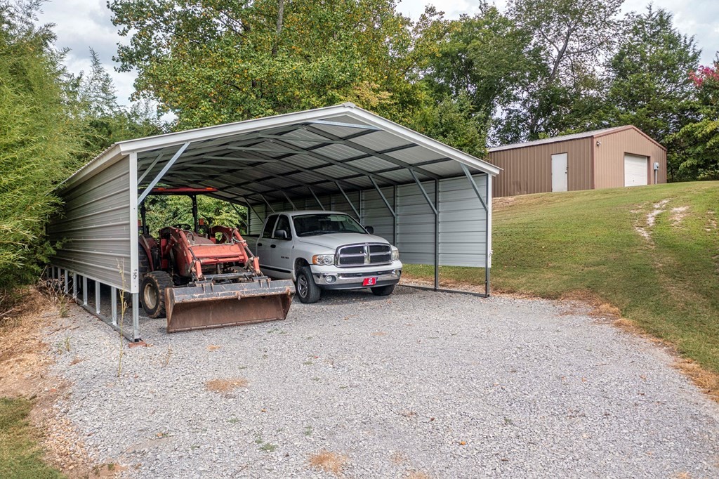 9068 Rhea County Highway Dayton, TN 37321 - Photo 4 of 34 a view of a car in front of house