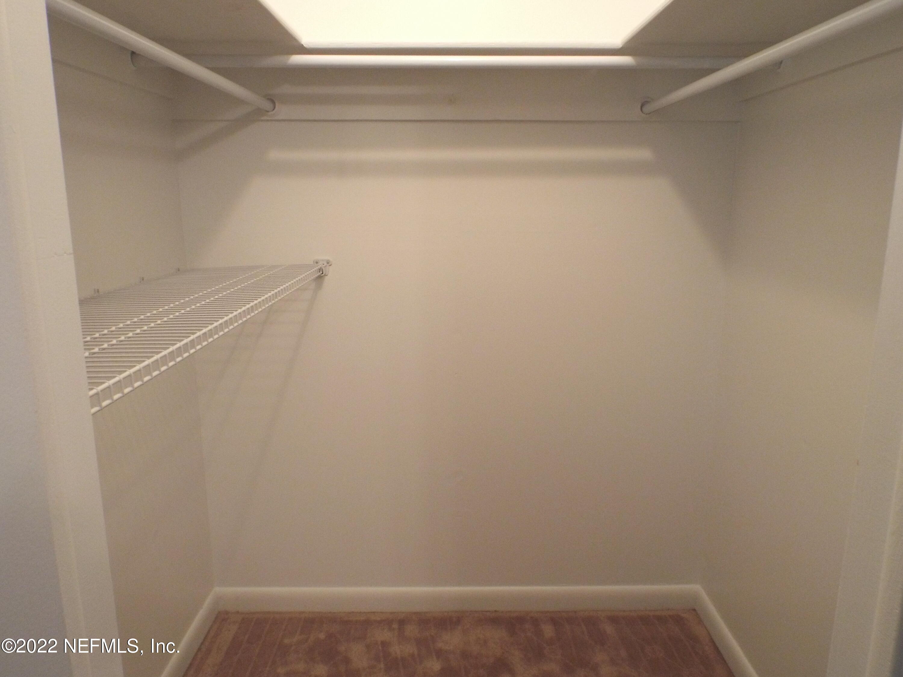 2282 Marcel Drive Orange Park, FL 32073 - Photo 21 of 29 a view of small space with racks on the wall