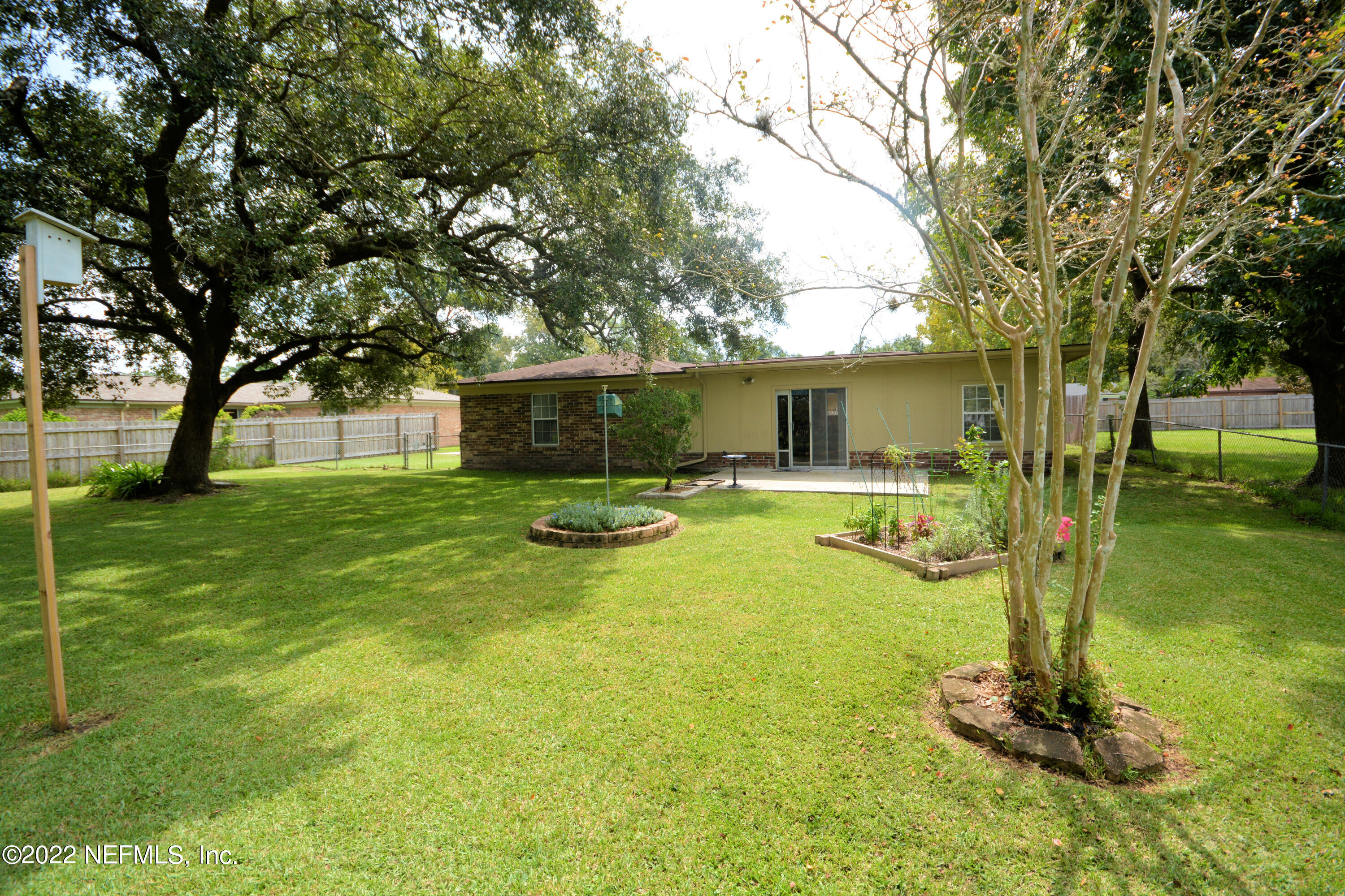 2282 Marcel Drive Orange Park, FL 32073 - Photo 26 of 29 a front view of a house with a yard