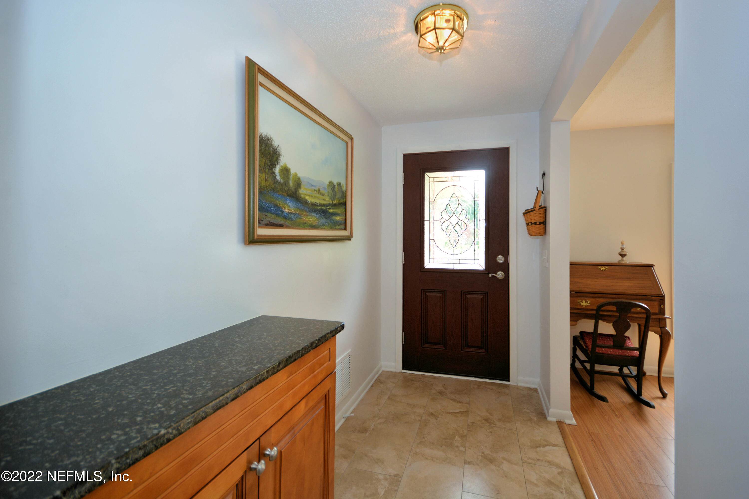 2282 Marcel Drive Orange Park, FL 32073 - Photo 4 of 29 a view of hallway with washer and dryer