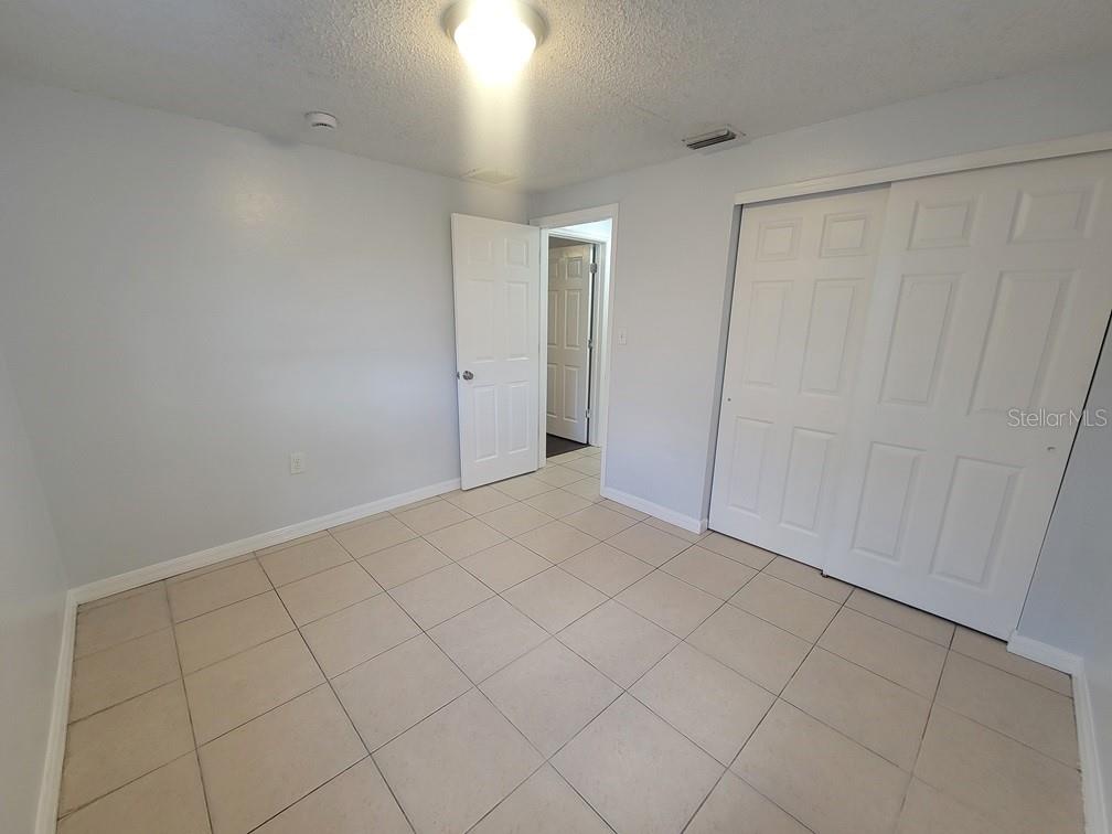 1415 Wickham Lane Holiday, FL 34691 - Photo 11 of 17 a view of an empty room