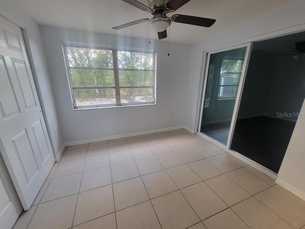 1415 Wickham Lane Holiday, FL 34691 - Photo 12 of 17 a view of an empty room with a window