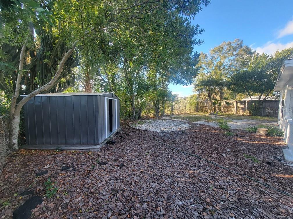 1415 Wickham Lane Holiday, FL 34691 - Photo 16 of 17 a view of backyard with green space