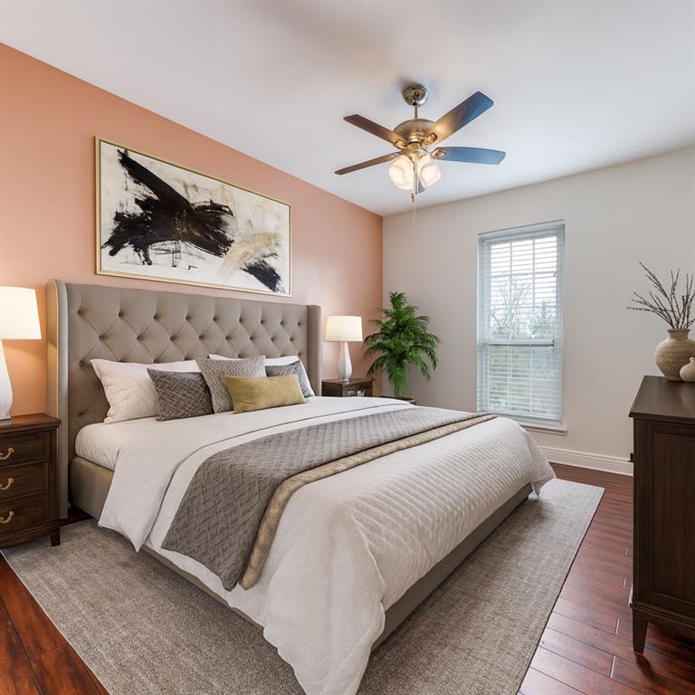 5407 Bryan Street, Unit B209 Dallas, TX 75206 - Photo 15 of 25 a bedroom with a large bed and a window