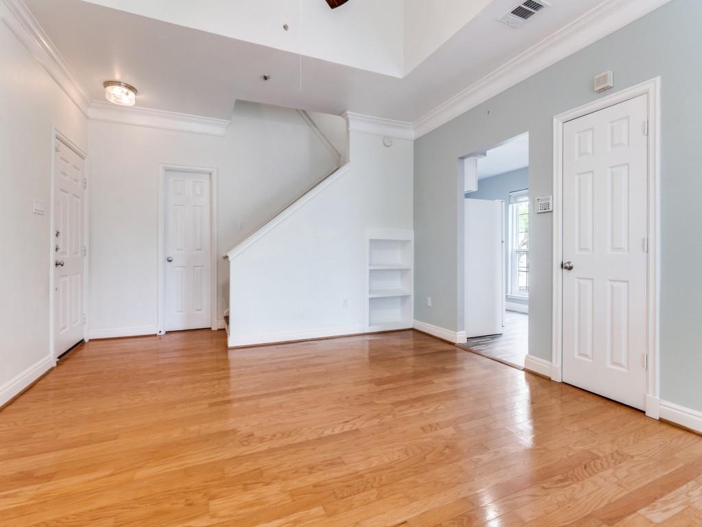 5407 Bryan Street, Unit B209 Dallas, TX 75206 - Photo 5 of 25 a view of an empty room with wooden floor