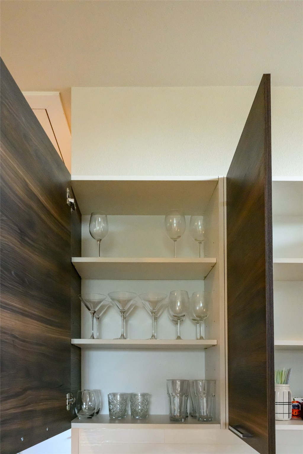 4618 Nichols Street, Unit B Houston, TX 77020 - Photo 19 of 49 Glass in Kitchen Cupboards