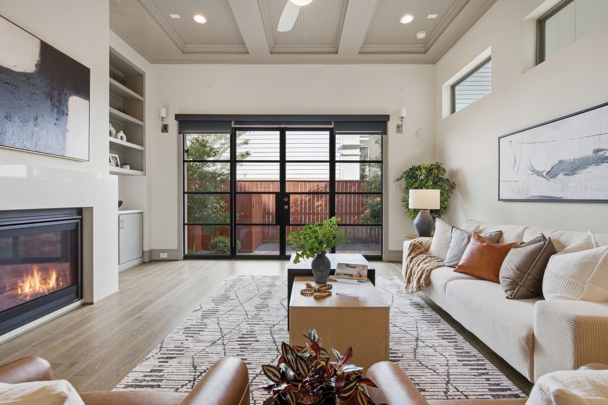 1906 West 25th Street Houston, TX 77008 - Photo 10 of 47 First floor living area, with added bonus of outdoor space and gas fireplace