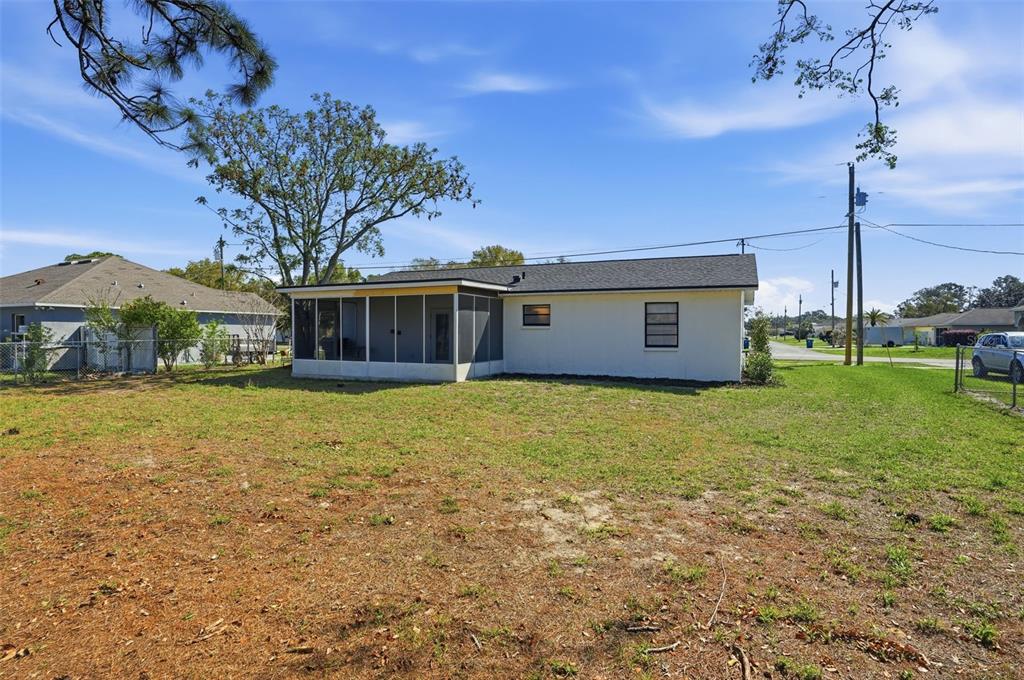 2076 Landover Boulevard Spring Hill, FL 34608 - Photo 29 of 37 a front view of a house with garden