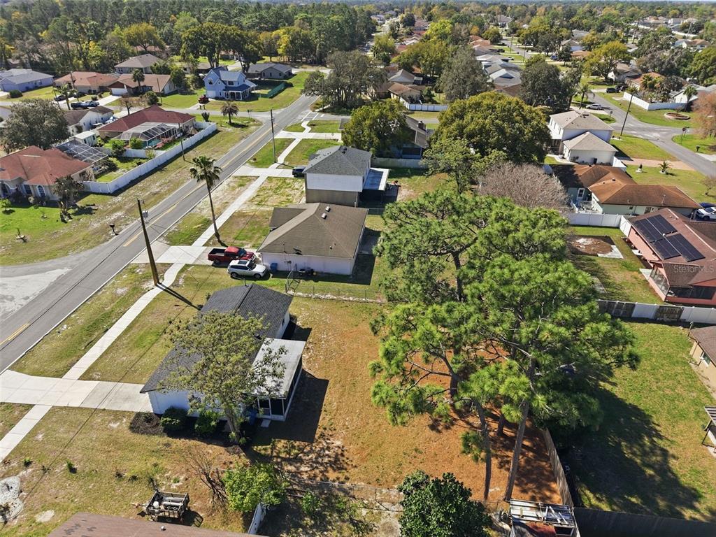2076 Landover Boulevard Spring Hill, FL 34608 - Photo 34 of 37 an aerial view of a residential houses with outdoor space