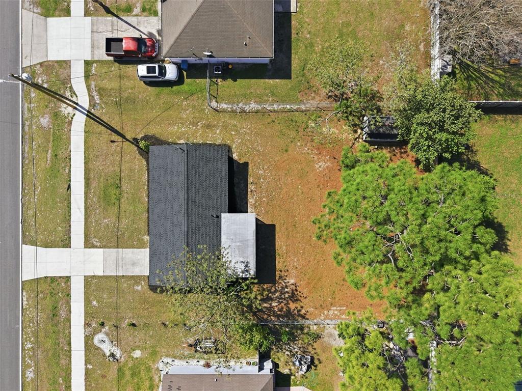 2076 Landover Boulevard Spring Hill, FL 34608 - Photo 36 of 37 front view of a house with a yard