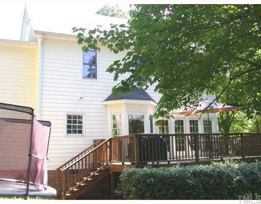 5120 Celbridge Place Raleigh, NC 27613 - Photo 12 of 12 a view of a house with a yard