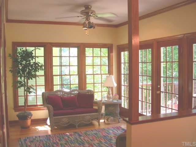 5120 Celbridge Place Raleigh, NC 27613 - Photo 4 of 12 a living room with furniture and a large window