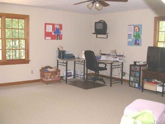 5120 Celbridge Place Raleigh, NC 27613 - Photo 10 of 12 a workspace with furniture and window