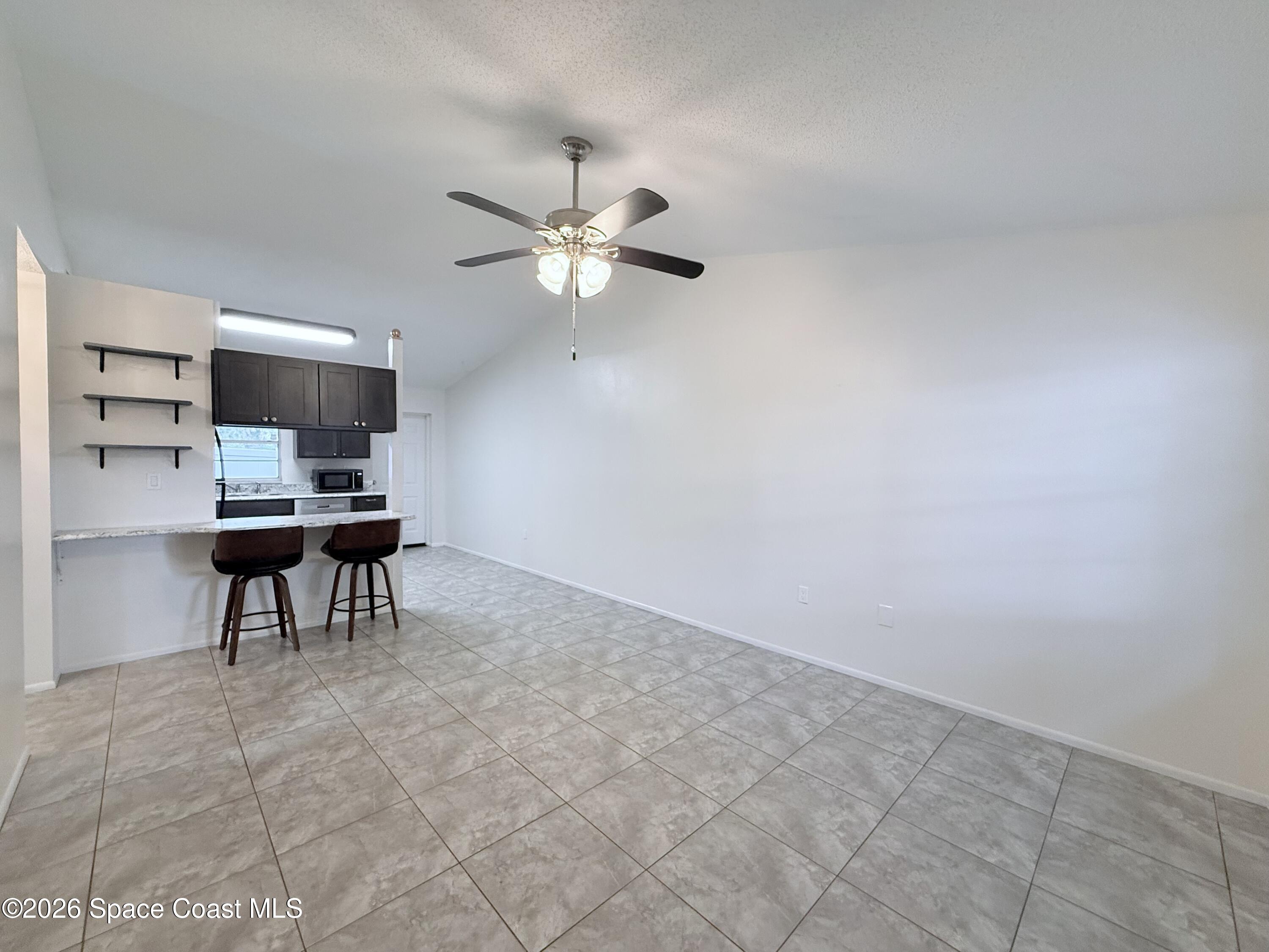 3225 Murrell Road, Unit 4 Rockledge, FL 32955 - Photo 3 of 22 IMG_4527