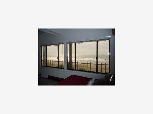420 Oceanview Drive Watsonville, CA 95076 - Photo 6 of 9 a picture of a living room with a floor to ceiling window
