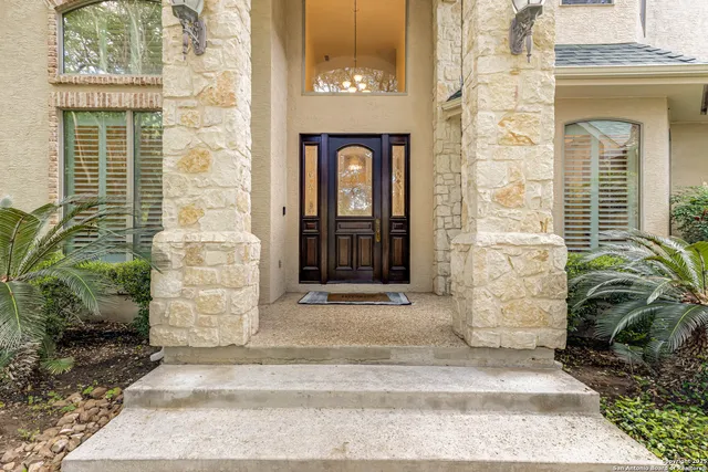 a front view of a house with a white door