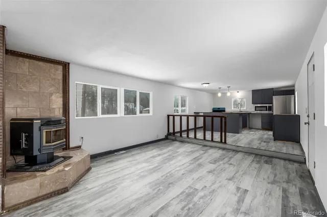 a view of livingroom with furniture and windows