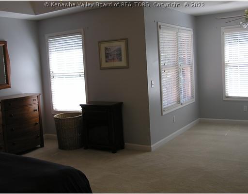 1399 Bedford Road Charleston, WV 25314 - Photo 7 of 16 Master Bedroom. Master bedroom with two walk-in closets (with organizers) Room size does not include 8 x 9.6 L shape as shown. Lots of light.