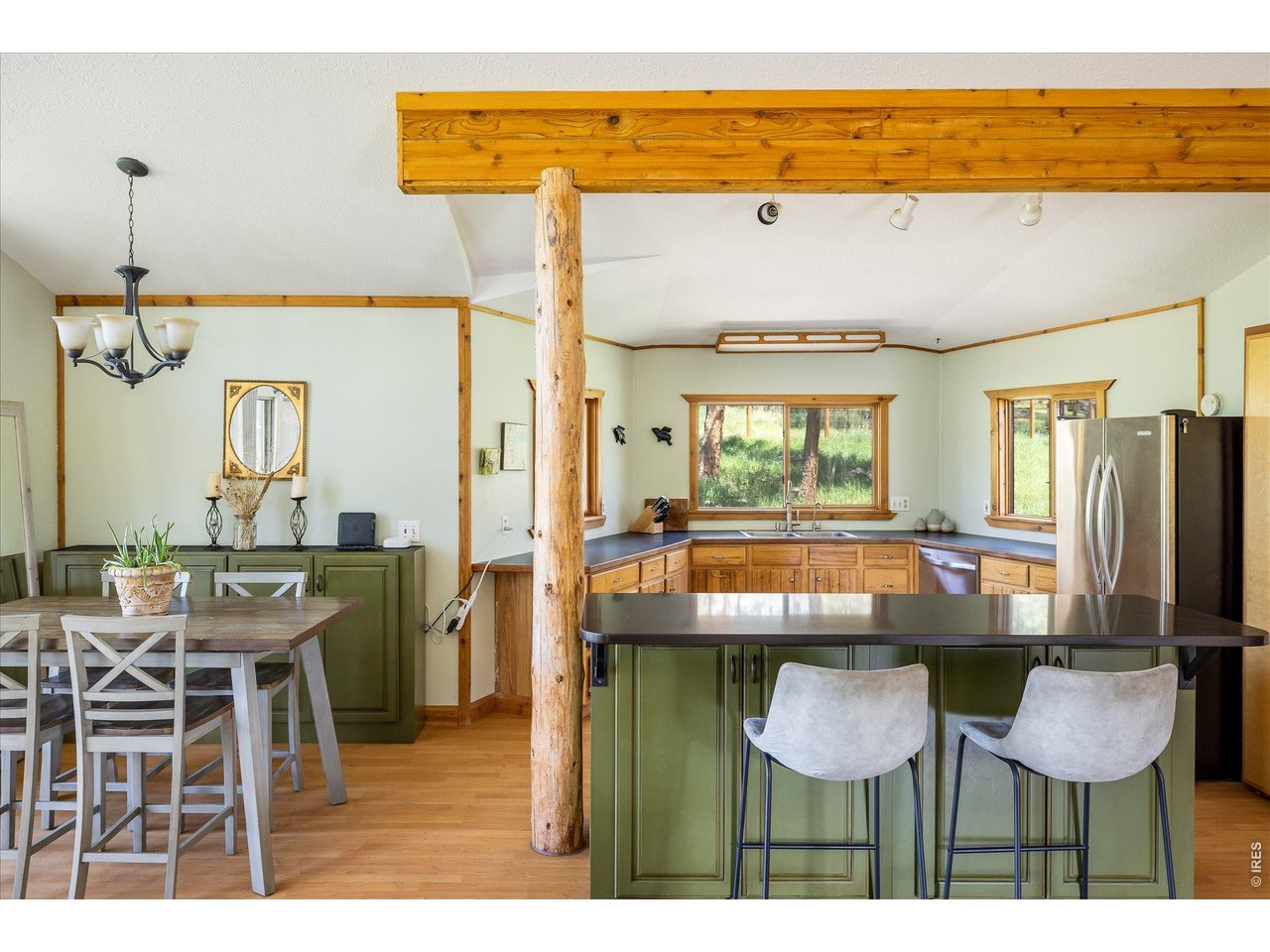 201 Wild Tiger Road Boulder, CO 80302 - Photo 13 of 43 exposed wood beam and a natural log post adds mountain charm