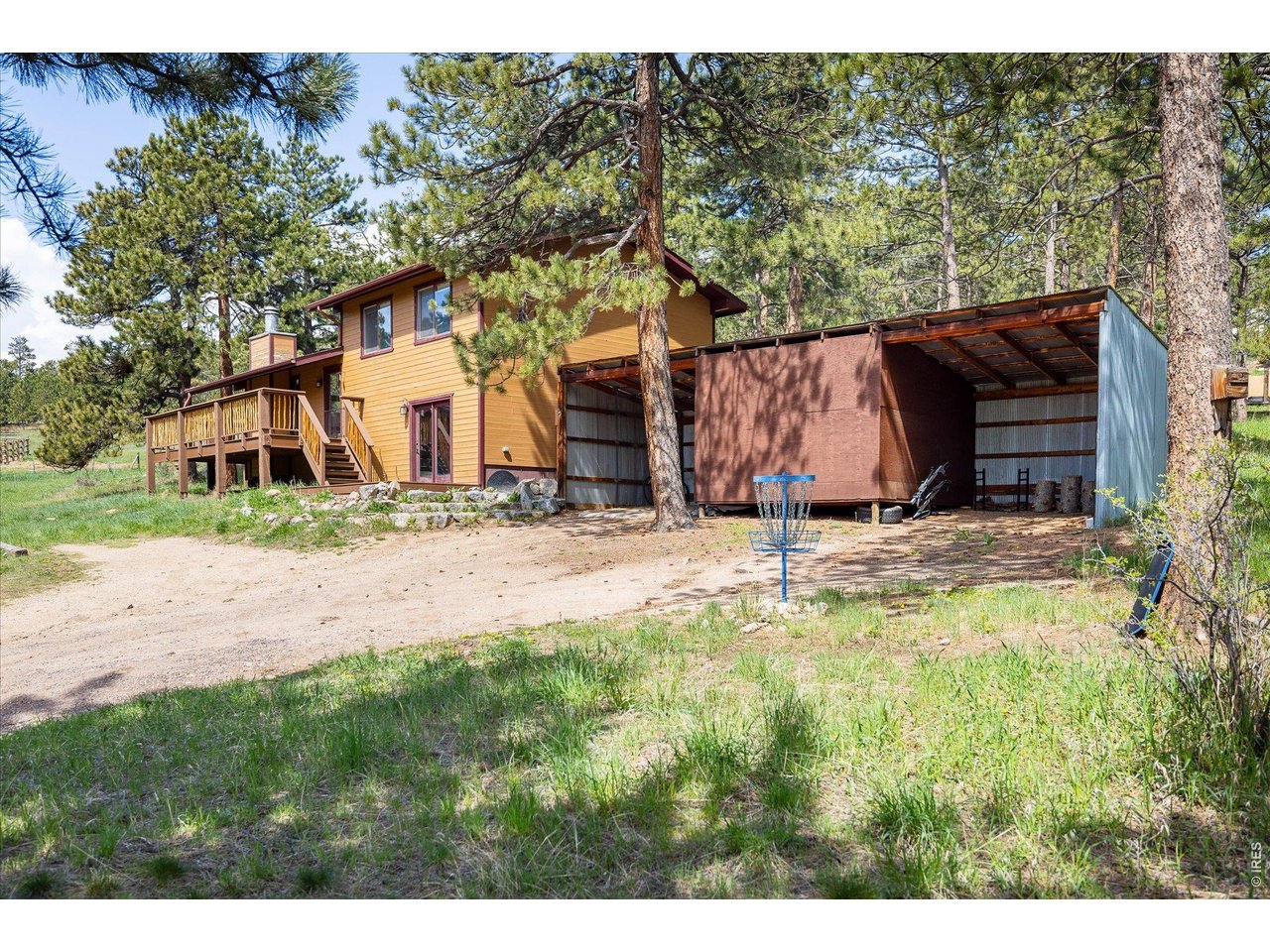 201 Wild Tiger Road Boulder, CO 80302 - Photo 4 of 43 a two-car carport with a large storage area or loafing shed adding everyday convenience