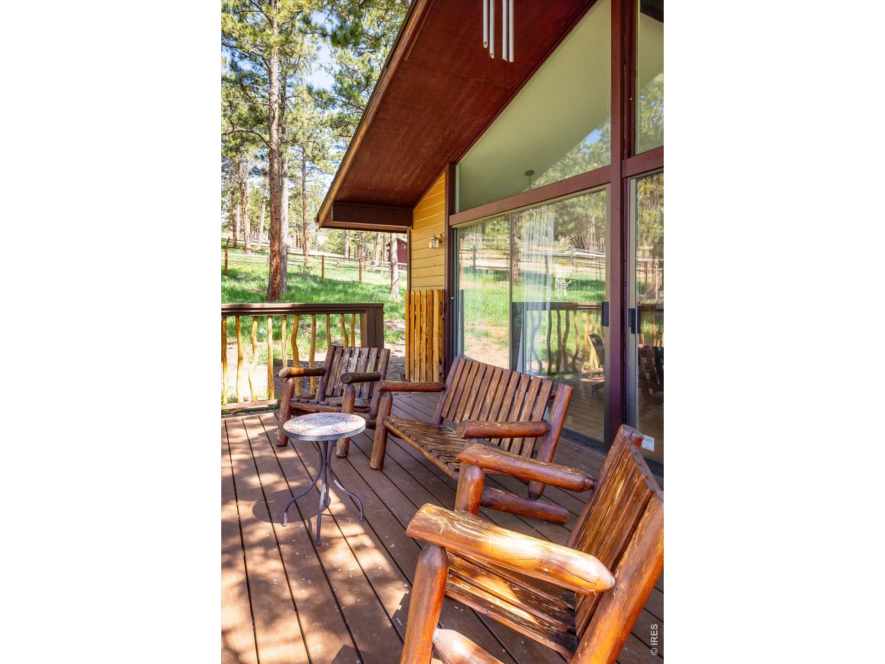 201 Wild Tiger Road Boulder, CO 80302 - Photo 8 of 43 unwind with tranquil views of meadows and mature tree