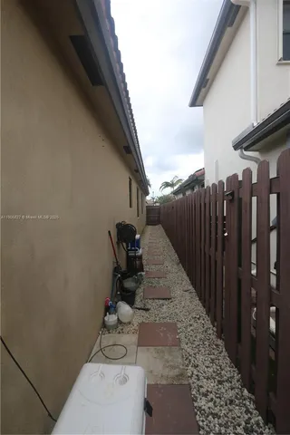 a view of balcony with furniture
