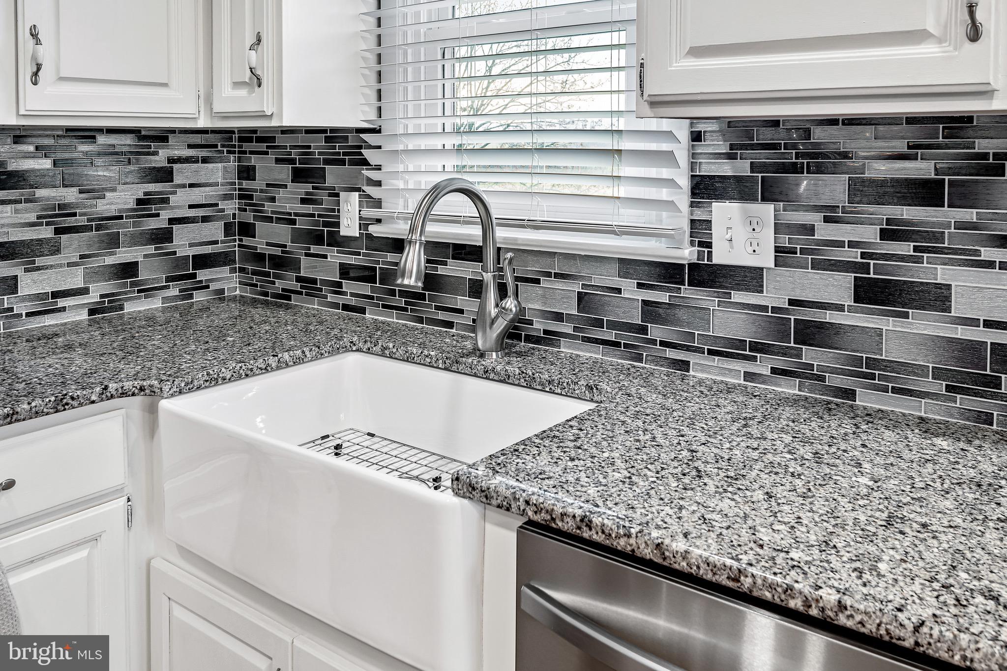 126 Enders Grove Road Halifax, PA 17032 - Photo 14 of 35 a kitchen with a sink and a stove