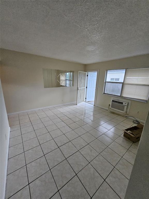 716 Southwest 7th Street, Unit 1 Dania Beach, FL 33004 - Photo 2 of 15 a view of a livingroom and entryway