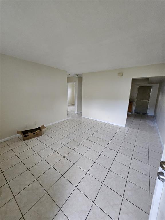716 Southwest 7th Street, Unit 1 Dania Beach, FL 33004 - Photo 5 of 15 a view of an empty room and storage