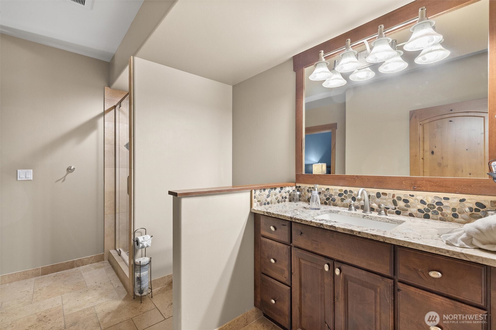 251 Evergreen Valley Loop Road Ronald, WA 98940 - Photo 28 of 40 a bathroom with a sink and a mirror