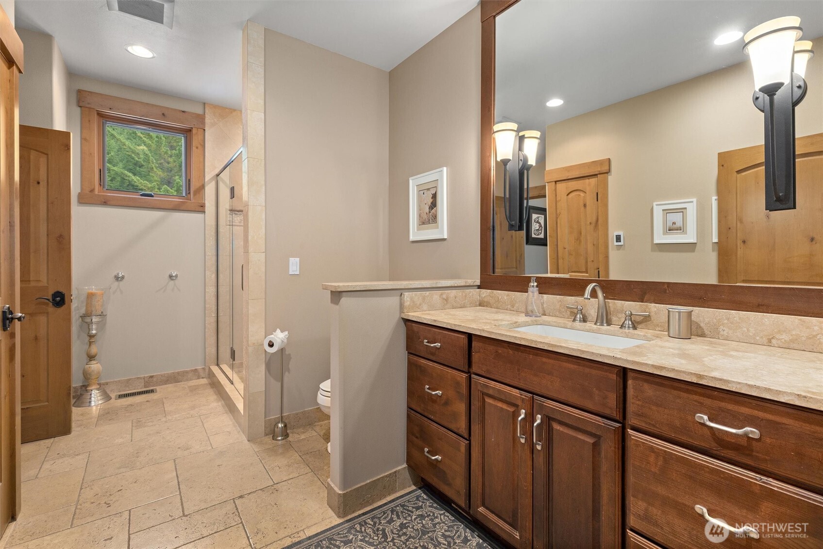 251 Evergreen Valley Loop Road Ronald, WA 98940 - Photo 34 of 40 a spacious bathroom with a granite countertop sink a mirror and a