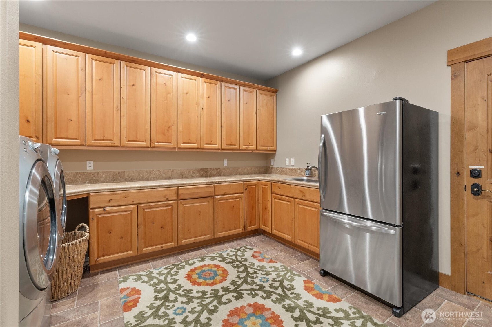 251 Evergreen Valley Loop Road Ronald, WA 98940 - Photo 36 of 40 a kitchen with stainless steel appliances granite countertop a refrigerator and a sink