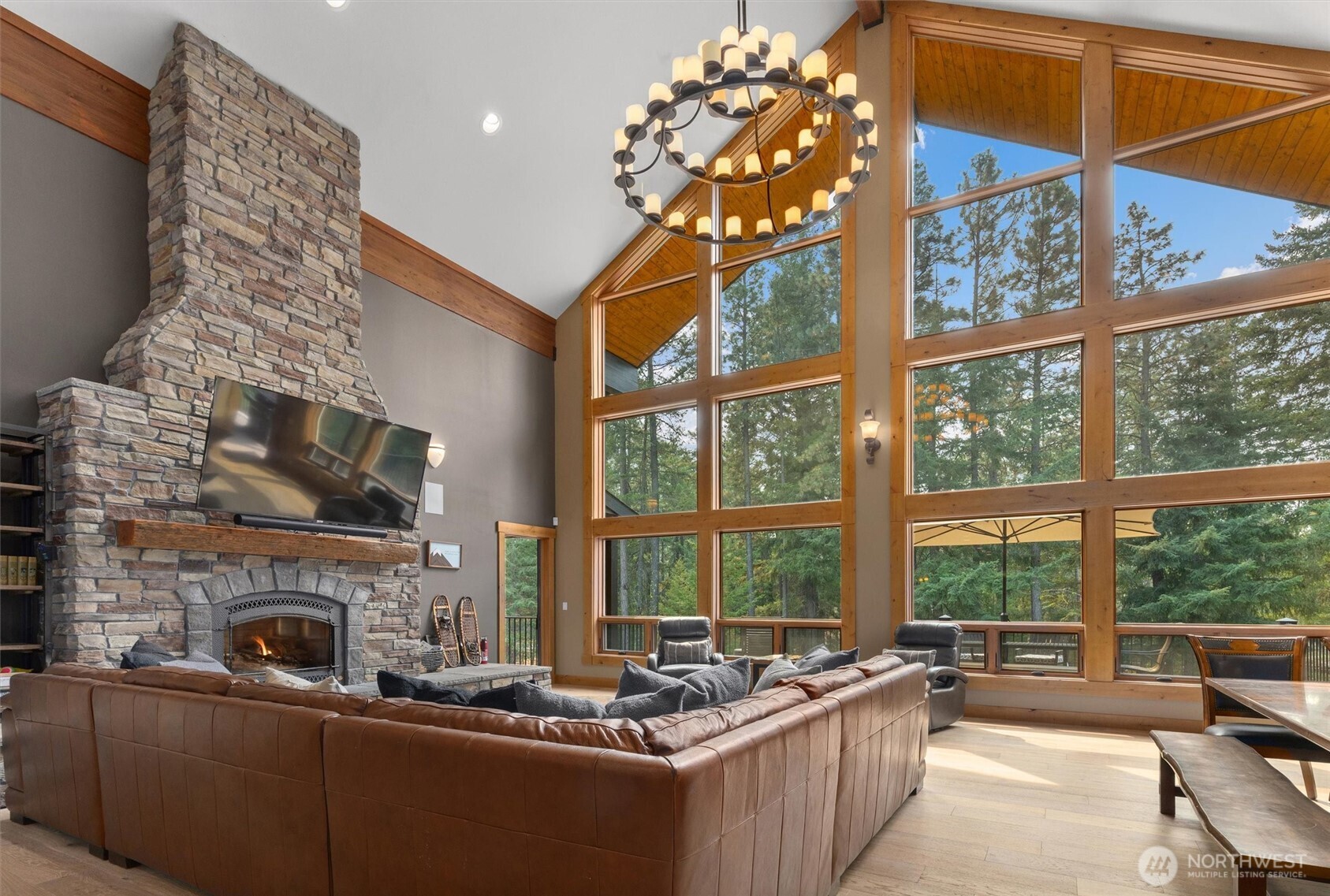 251 Evergreen Valley Loop Road Ronald, WA 98940 - Photo 6 of 40 a living room with fireplace furniture and a large window