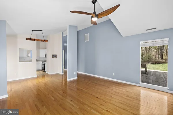a kitchen with stainless steel appliances a refrigerator stove and microwave