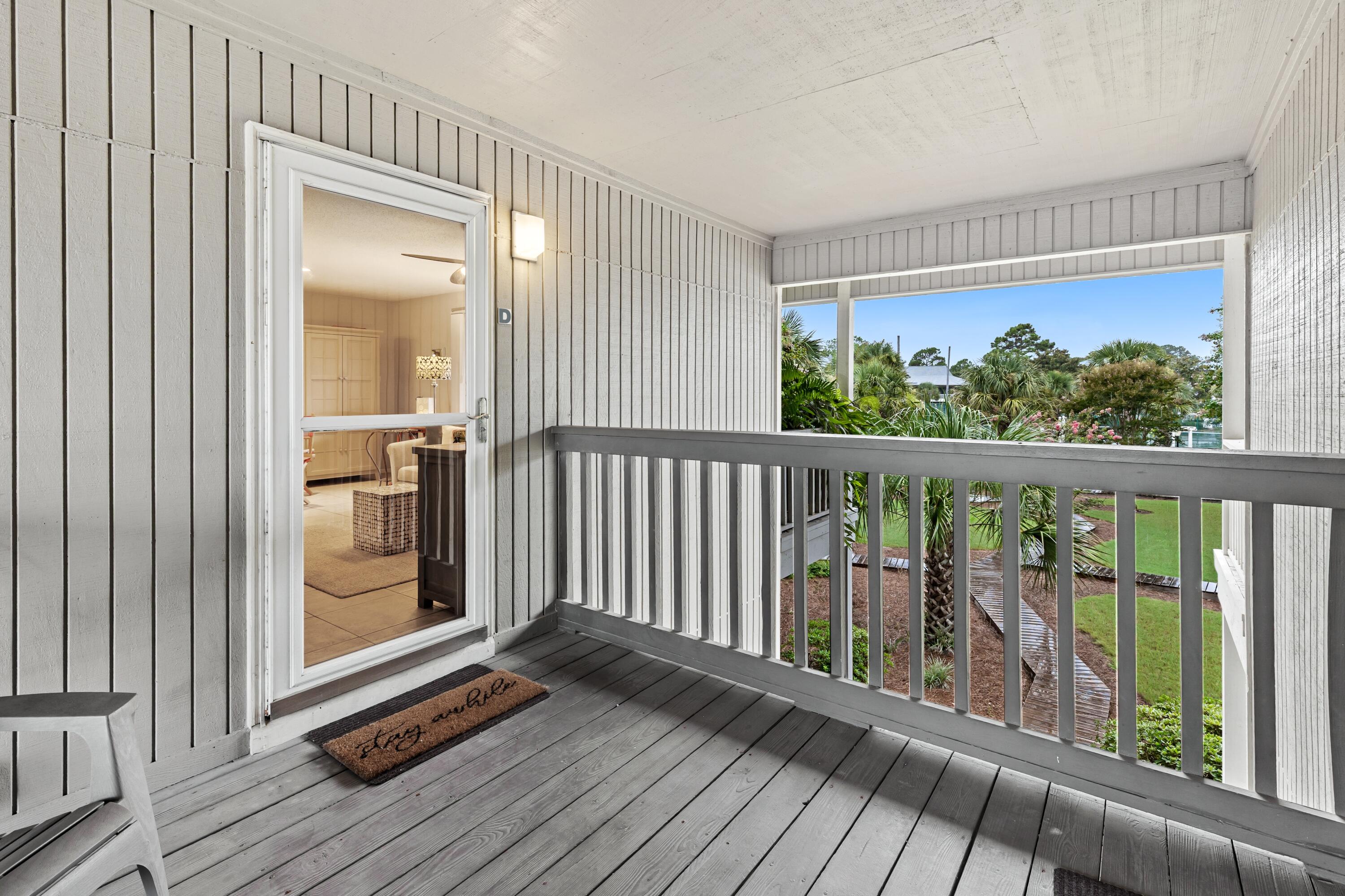 3799 East County Highway 30A, Unit D5 Santa Rosa Beach, FL 32459 - Photo 11 of 34 a view of a balcony with wooden floor