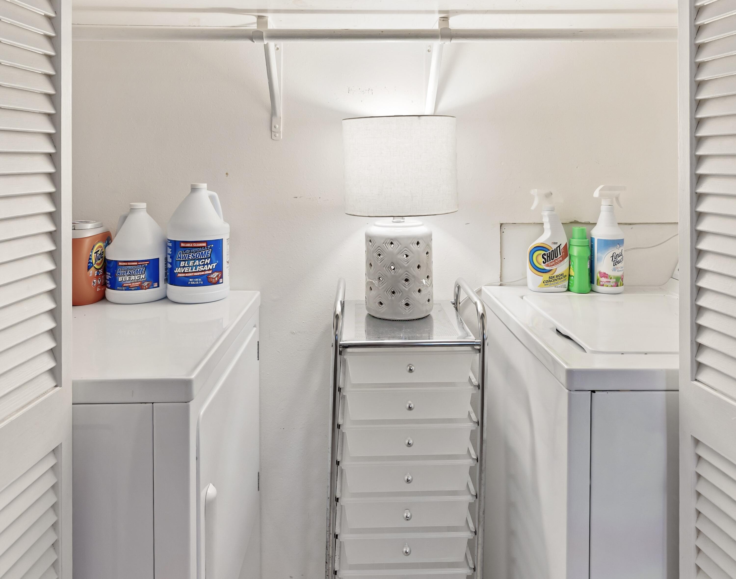 3799 East County Highway 30A, Unit D5 Santa Rosa Beach, FL 32459 - Photo 13 of 34 a kitchen with a sink a stove and cabinets