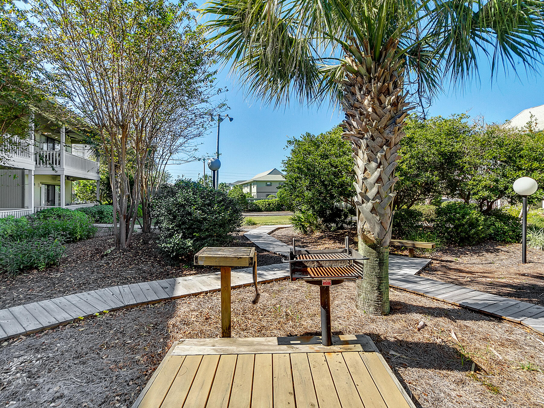 3799 East County Highway 30A, Unit D5 Santa Rosa Beach, FL 32459 - Photo 16 of 34 a view of a backyard with a sitting area