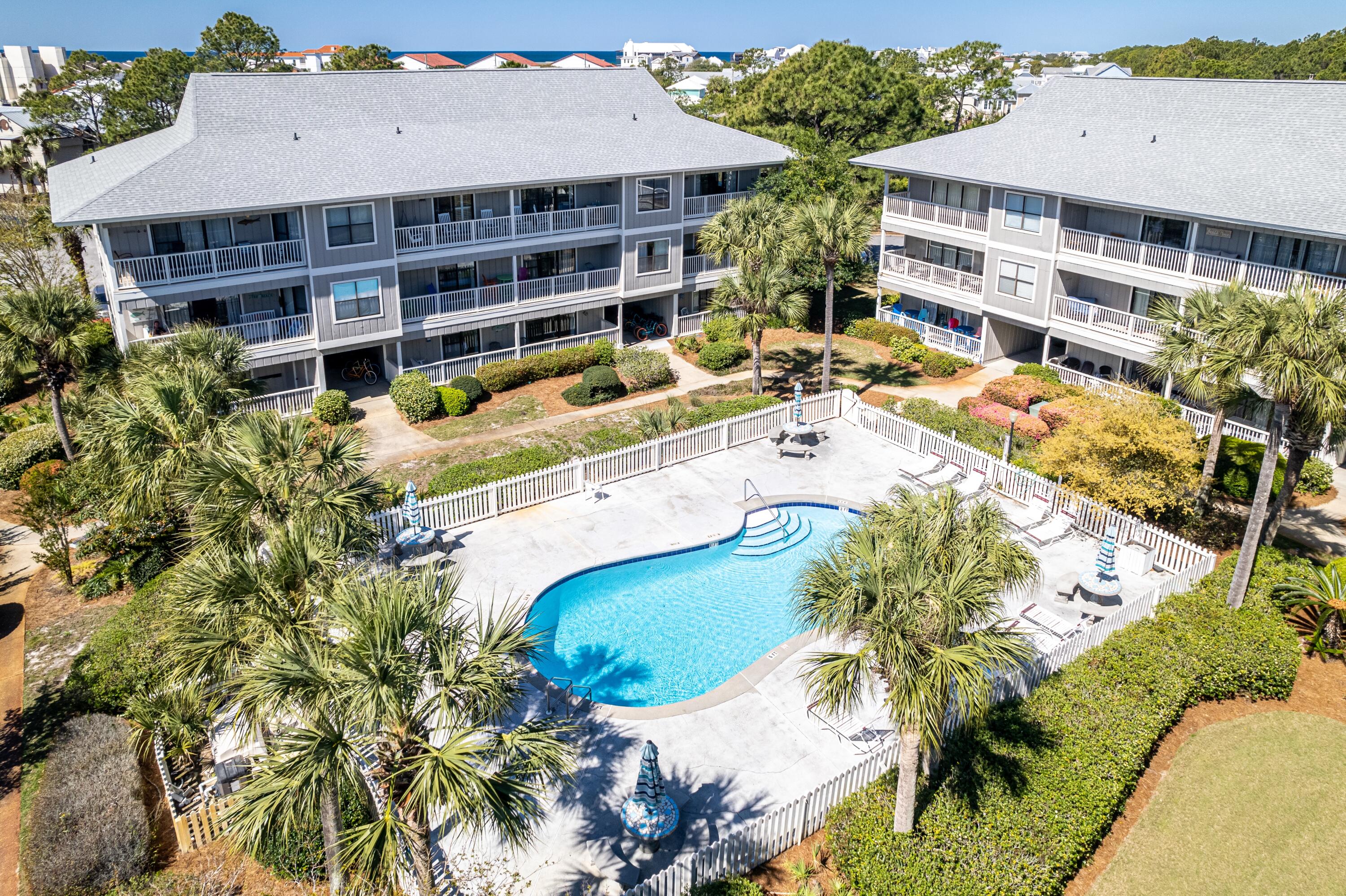 3799 East County Highway 30A, Unit D5 Santa Rosa Beach, FL 32459 - Photo 18 of 34 an aerial view of a house with a swimming pool