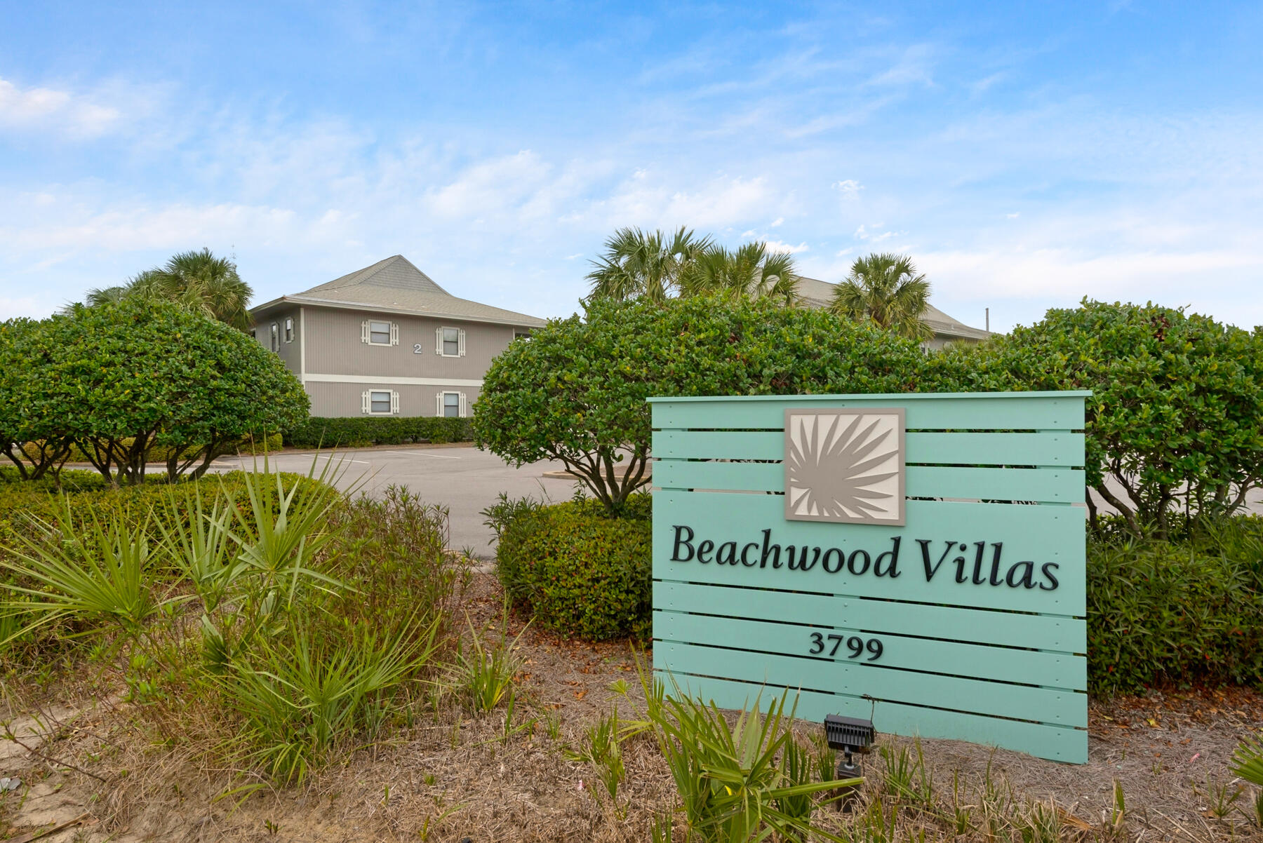 3799 East County Highway 30A, Unit D5 Santa Rosa Beach, FL 32459 - Photo 19 of 34 a view of a sign in front of a house with a yard