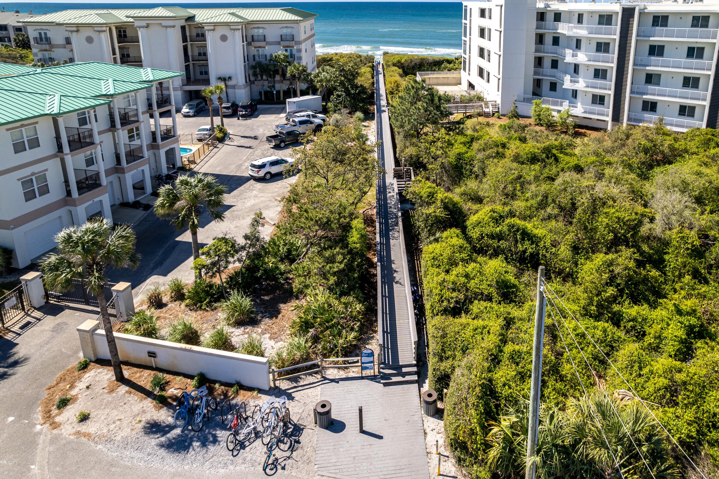 3799 East County Highway 30A, Unit D5 Santa Rosa Beach, FL 32459 - Photo 27 of 34 a view of a chairs and table in the patio