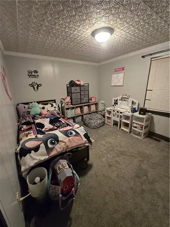 a living room with furniture and a tv