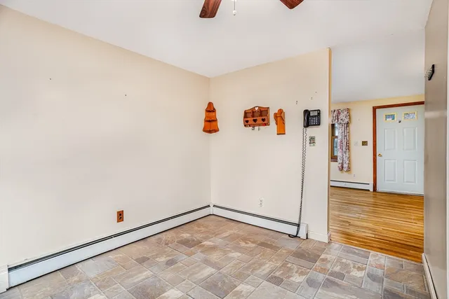 a view of a livingroom with wooden floor