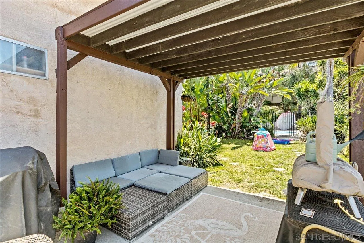 2337 Fallingleaf Road Oceanside, CA 92056 - Photo 24 of 34 a living room filled with furniture