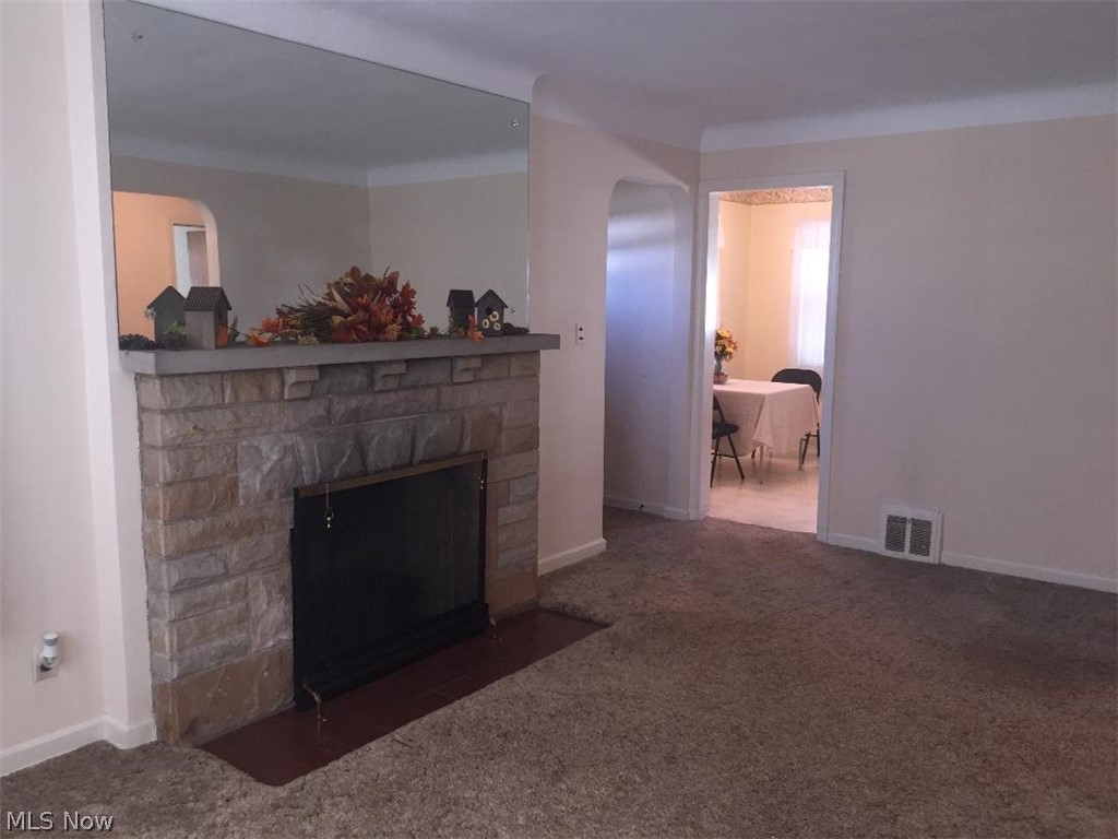 13812 Granger Road Cleveland, OH 44125 - Photo 4 of 29 A great space for relaxing or entertaining. You could easily replace the mirror with your favorite flat screen T.V. :)